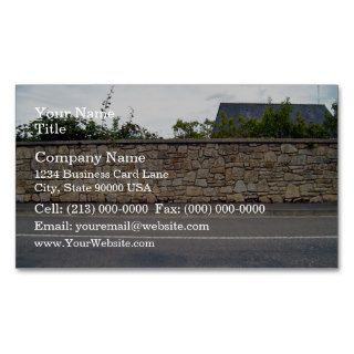 Beautiful Shot of Stone Wall and Plants Against Bl Business Card