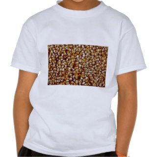Close up of unpopped popcorn kernels texture tees