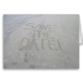 Save the date card, written in the sand