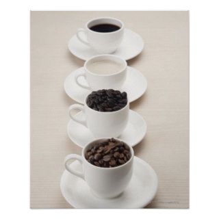 Close up of coffee and coffee beans on four cups print