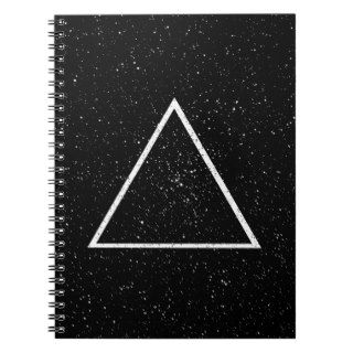White triangle outline on black star background spiral notebooks