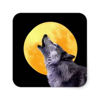 Wolf howls at the full moon square sticker