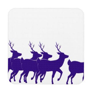 purple reindeer across the bottom beverage coaster