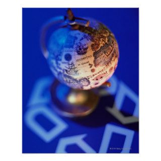 World globe atop recycling symbol poster