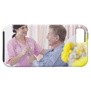 Nurse giving patient medication in hospital iPhone 5 cover