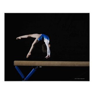 Gymnast (9 10) flipping on balance beam, side poster