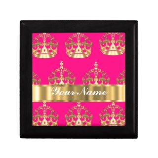 Gold crowns on hot pink jewelry boxes