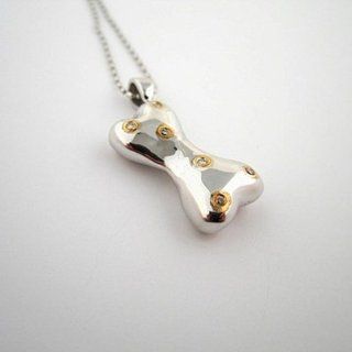 Sterling and Gold Diamond Dog Bone Charm by TL Garcia   Frontgate  Pet Coats 