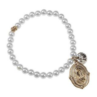 Catholic & Religious Sacred Heart of Jesus Bracelet. Ivory Pearl Religious Relics Stretch Bracelet •Features * Worn Gold/ Antique Silver Plating * Ivory Pearl Stretch Bracelet * Chain Cluster Accent * 2 tone Religious Relics Charms * Stretch 1