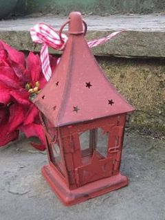 red 'star' christmas lantern by the hiding place