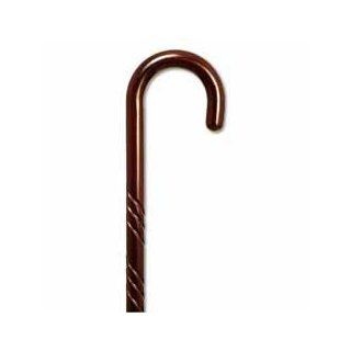 Carved wood Cane   walnut stain color. This traditional walking cane can be used in either right or left hand. This cane is also known as hospital cane. It is made in solid wood, weight capacity 250 pounds, height 36 37 inches. See All King Of Canes Produc