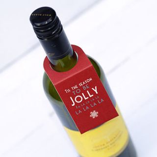 set of four festive wine bottle tags by this is pretty