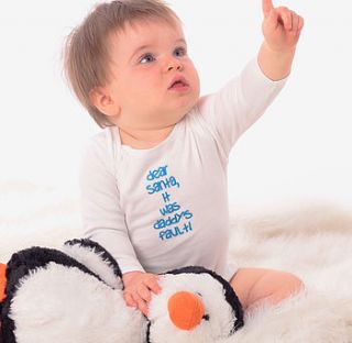 personalised 'santa it was…fault' babygrow by something for daisy