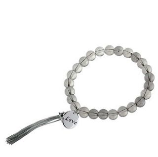 beaded stretch bracelet with charm   silver by kiki's