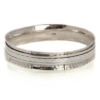 karma silver spinning bangle by charlotte's web