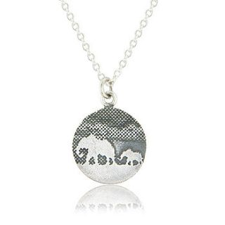 silver mother and baby elephant pendant by charlotte lowe jewellery