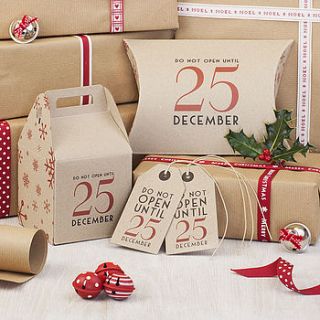 christmas gift boxes and tags by the contemporary home