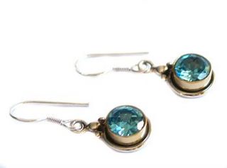 blue topaz two tone brass and silver earrings by prisha jewels