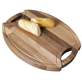 oval solid wood chopping board with handles by stuart clarkson design