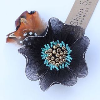 beaded flower corsage with feathers by shim sham