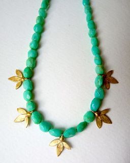 gold plate ami leaves on chrysoprase necklace by blossoming branch