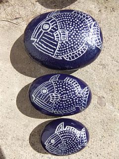 set of three fish on pebbles by heart in art
