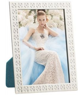 Receive a Complimentary Picture Frame with $115 Oscar de la Renta Something Blue fragrance purchase      Beauty