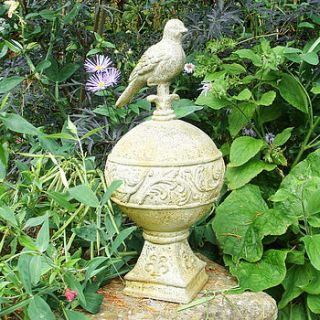 bird on ball garden ornament by miafleur