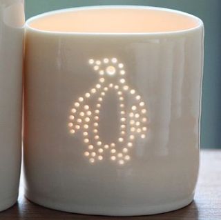 porcelain penguin tea light by luna lighting