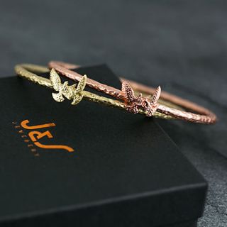 hammered bird motif bangle bracelet by j&s jewellery