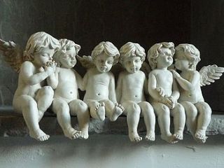 sitting cherubs by daisy west