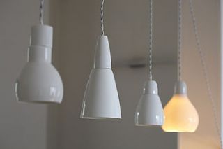 white bone china pendant light by bodie and fou