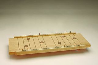 wooden shipboard game by the original game company