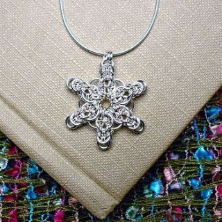 handmade snowflake pendant by woven silver jewellery