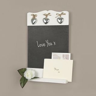 french white wall chalkboard with silver hanging hearts by dibor