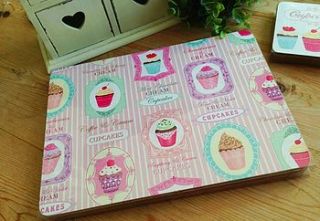 set four cupcake placemats by the hiding place