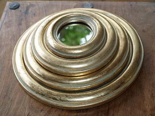 set of four round gold leaf mirrors by begolden