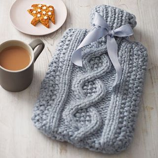 handknit 'cable' cover with hot water bottle by chi chi moi