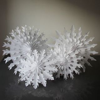 set of four paper tissue snowflakes by pearl and earl