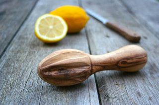 olive wood lemon squeezer by the rustic dish