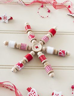 christmas star sewing bobbin decoration by the contemporary home