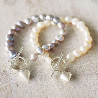 pearl bracelet with silver heart charm by lilac coast