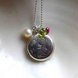 round vintage silver locket necklace by lime tree design