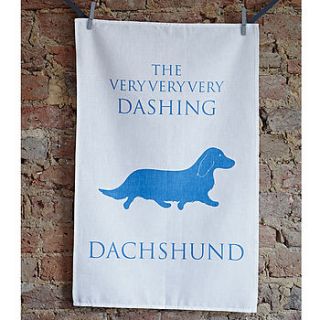'the dashing dachshund' tea towel by bottle green homes