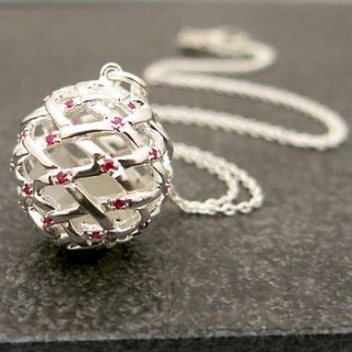 ruby and white topaz ball pendant by kinnari