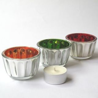 set of three coloured tea light holders by aroma candles