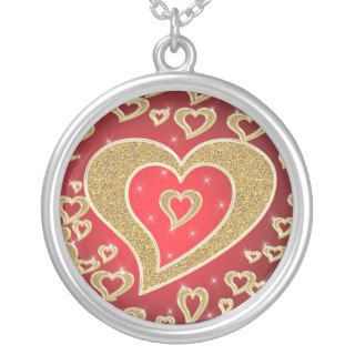 gold hearts on red background custom jewelry