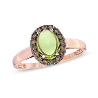 Oval Peridot and 1/4 CT. T.W. Enhanced Champagne Diamond Ring in 10K