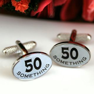 50 something cufflinks by a type of design