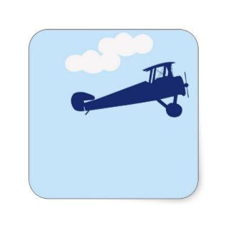 Airplane on plain pastel blue background. square stickers
